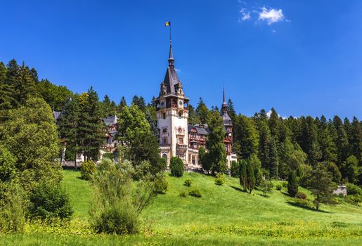Peles Castle, Romania. Beautiful famous royal castle and ornamental garden in Sinaia landmark of Carpathian Mountains in Europe