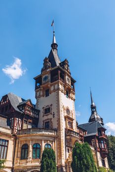Peles Castle, Romania. Beautiful famous royal castle and ornamental garden in Sinaia landmark of Carpathian Mountains in Europe
