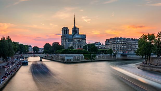 Notre Dame de Paris cathedral at sunset, France. Notre Dame de Paris, most beautiful Cathedral in Paris. Picturesque sunset over Cathedral of Notre Dame de Paris, destroyed in a fire in 2019, Paris.