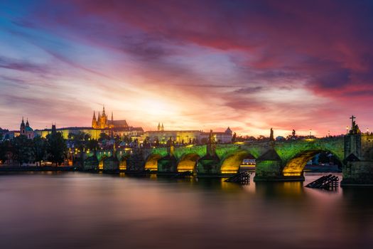 Charles Bridge at sunset with colorful sky, Prague, Czech Republic. Prague old town and iconic Charles bridge and Castle, Czech Republic. Charles Bridge (Karluv Most), Old Town Tower and Castle.