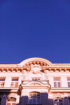 Exterior facade of classic building in the European city, architecture and design detail