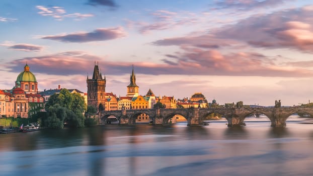 Famous iconic image of Charles bridge, Prague, Czech Republic. Concept of world travel, sightseeing and tourism.