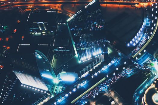 Aerial night view of Dubai in United Arab Emirates, metropolitan cityscape scenery