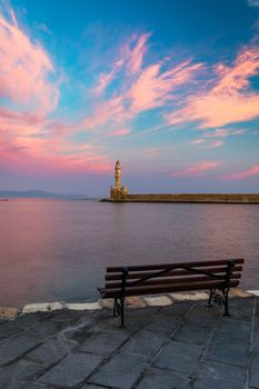 Venetian harbour and lighthouse in old harbour of Chania at sunrise, Crete, Greece. Old venetian lighthouse in Chania, Greece. Lighthouse of the old Venetian port in Chania, Greece.