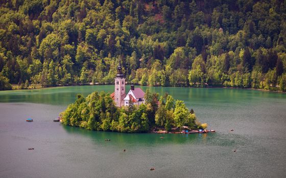 Lake Bled Slovenia. Beautiful mountain Bled lake with small Pilgrimage Church. Most famous Slovenian lake and island Bled with Pilgrimage Church of the Assumption of Maria. Bled, Slovenia.