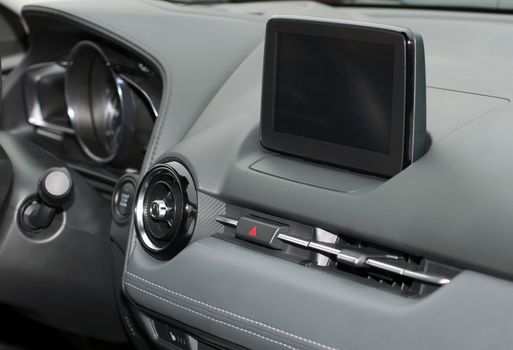 Modern car dashboard. Screen multimedia system. Interior detail