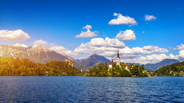 Lake Bled Slovenia. Beautiful mountain lake with small Pilgrimage Church. Most famous Slovenian lake and island Bled with Pilgrimage Church of the Assumption of Maria. Bled, Slovenia, Europe. 