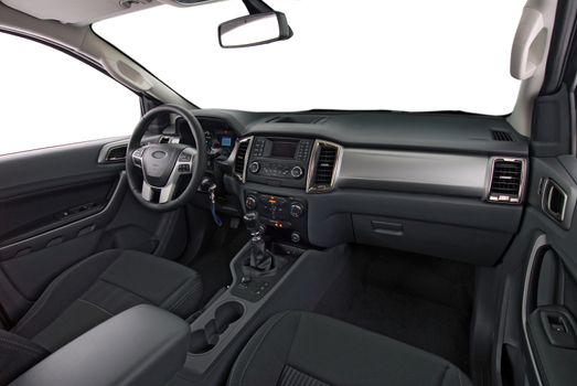 studio shot passenger car interior, front view