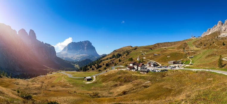 Gardena Pass, Trentino Alto Adige, Italy. Gardena Pass with Sassolungo mountain on the background. Passo Gardena, alpine pass between Val Badia and Val Gardena, South Tyrol, Italy.