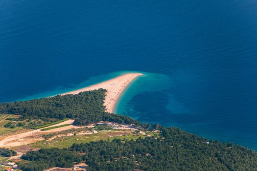 Zlatni Rat (Golden Cape or Golden Horn) famous turquoise beach in Bol town on Brac island, Dalmatia, Croatia. Zlatni Rat sandy beach at Bol on Brac island of Croatia in summertime.