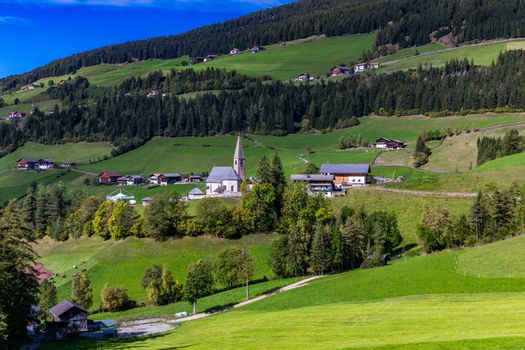 Santa Maddalena (Santa Magdalena) village with magical Dolomites mountains in background, Val di Funes valley, Trentino Alto Adige region, South Tyrol, Italy, Europe. Santa Maddalena Village, Italy. 