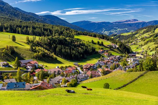 Santa Maddalena (Santa Magdalena) village with magical Dolomites mountains in background, Val di Funes valley, Trentino Alto Adige region, South Tyrol, Italy, Europe. Santa Maddalena Village, Italy. 