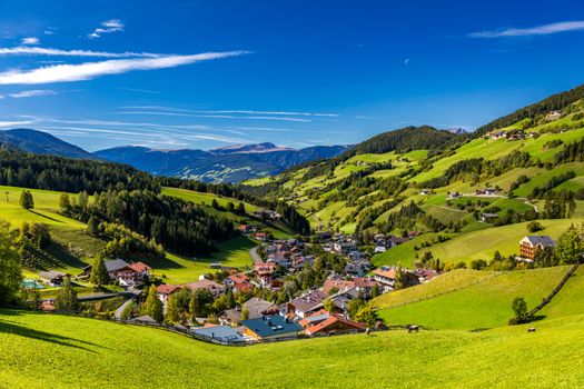 Santa Maddalena (Santa Magdalena) village with magical Dolomites mountains in background, Val di Funes valley, Trentino Alto Adige region, South Tyrol, Italy, Europe. Santa Maddalena Village, Italy. 