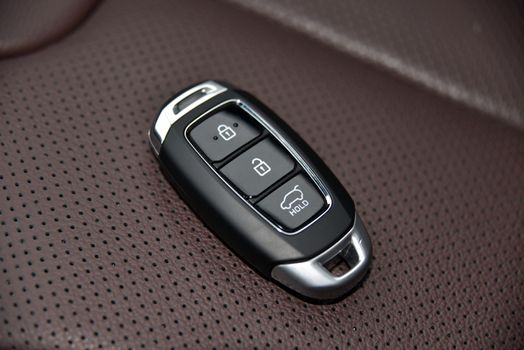 pop-up car key with remote central locking on white background