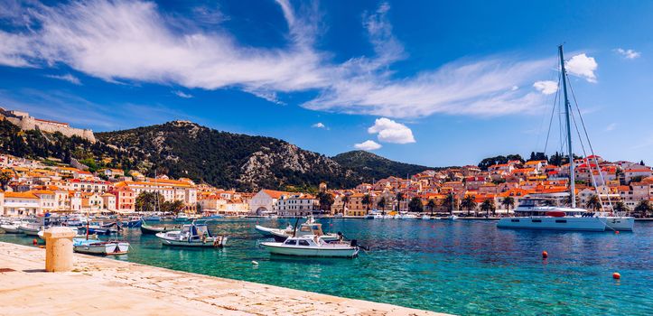 Colorful scenery in mediterranean town Hvar, famous travel place on Adriatic Sea, Croatia. Amazing Hvar city on Hvar island, Croatia. View of the Hvar town, Hvar island, Dalmatia, Croatia.