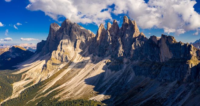 Panorama on Seceda peaks. Trentino Alto Adige, Dolomites Alps, South Tyrol, Italy. Odle mountain range, Val Gardena. Majestic Furchetta peak. Odles group seen from Seceda, Santa Cristina Val Gardena.