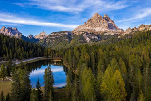 Aerial drone view of Lake Antorno (Lago di Antorno) located in Dolomites area, Belluno Province, Italy. Lake Antorno, Three Peaks of Lavaredo, Lake Antorno and Tre Cime di Lavaredo, Dolomites, Italy.