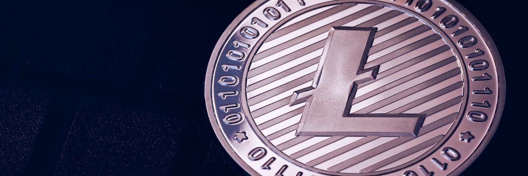 Litecoin cryptocurrency (crypto currency). Silver Litecoin coin with gold Litecoin symbol. Litecoin (ltc) cryptocurrency.