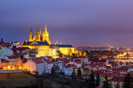 Prague Castle and Lesser Town panorama by night. View from Petrin Hill. Prague, Czech Republic. View of Prague Castle from Strahov monastery at night. Prague, Czech Republic 