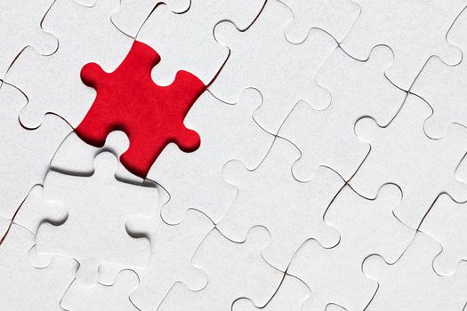 Jigsaw puzzle with missing piece. Missing puzzle pieces. Concept image of unfinished task. Completing final task, missing jigsaw puzzle pieces and business concept with a puzzle piece missing.