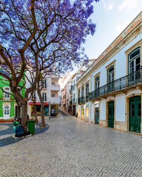 Street in the old town in the center of Lagos, Algarve region, Portugal. Narrow street in Lagos, Algarve, Portugal. Streets in the historic old town of Lagos, Algarve, Portugal.