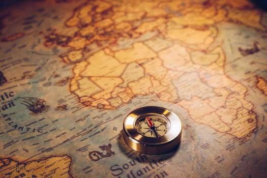 Map with compass. Simple navigation tools to orient in the world. The map used for background is in Public domain. Map source: Library of Congress. Country: Belgium Year: 1570. Author: Abraham Ortelius (1527-1598)