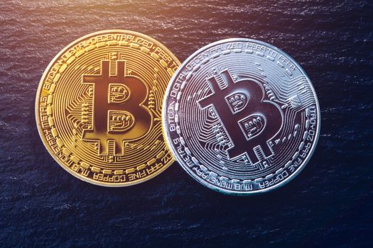 Crypto currency golden coin with bitcoin symbol on isolated on black background. Bitcoin Coin on black background. Bitcoin cryptocurrency.  Cryptocurrency Coin Concept.