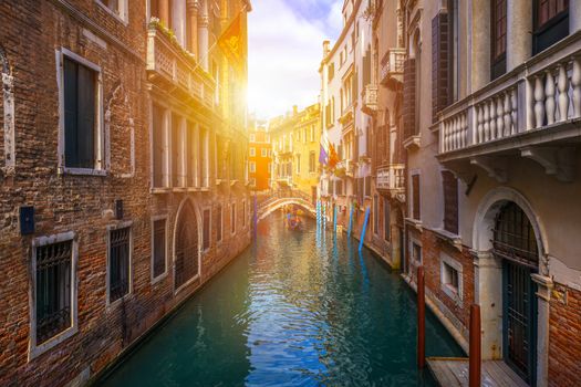 Canal with gondolas in Venice, Italy. Architecture and landmarks of Venice. Venice postcard with Venice gondolas.