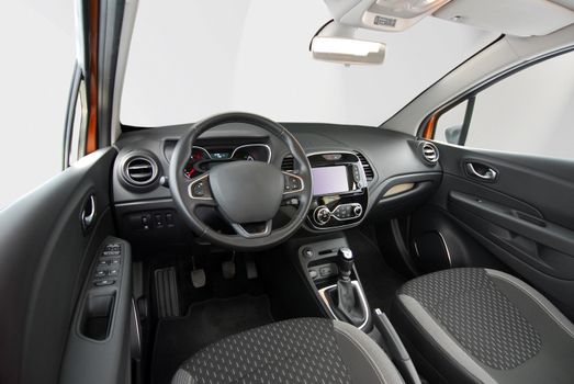 studio shot passenger car interior, front view