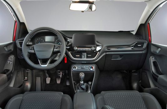 studio shot passenger car interior, front view