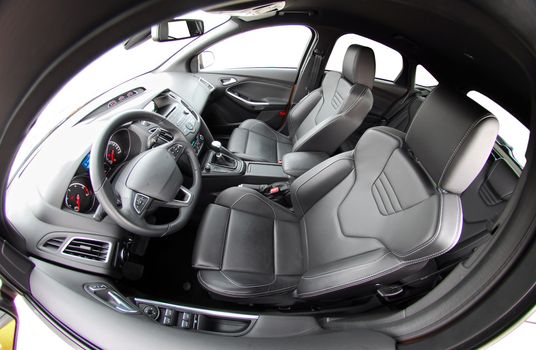 studio shot passenger car interior, front view