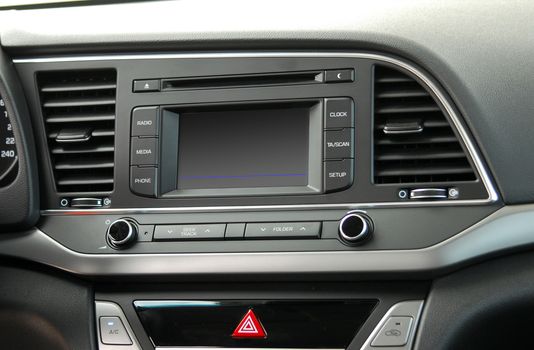 Modern car dashboard. Screen multimedia system. Interior detail