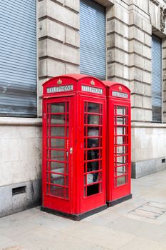 Traditional red telephone box in London, UK