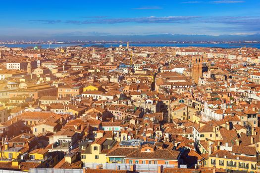 Venice panoramic aerial view with red roofs, Veneto, Italy. Aerial view of the Venice city, Italy. Venice is a popular tourist destination of Europe. Venice, Italy.