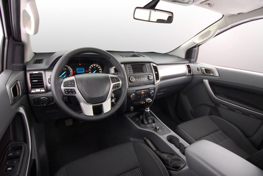 studio shot passenger car interior, front view