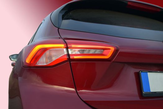 the tail lights on a luxury passenger car