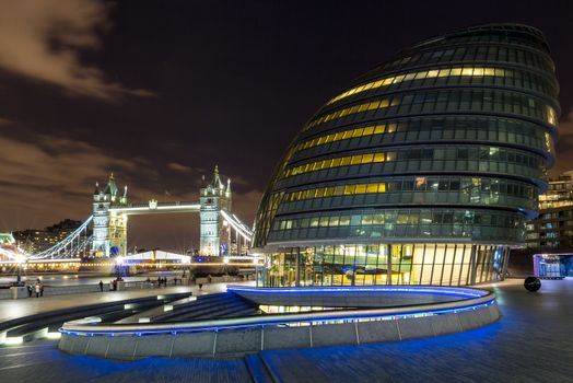 Tower Bridge and City Hall at night, London, England.
