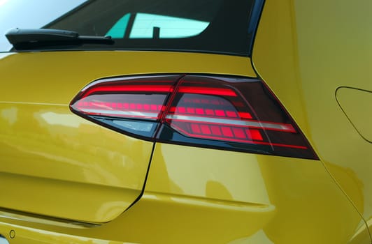 the tail lights on a luxury passenger car