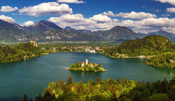 Lake Bled Slovenia. Beautiful mountain lake with small Pilgrimage Church. Most famous Slovenian lake and island Bled with Pilgrimage Church of the Assumption of Maria. Bled, Slovenia, Europe. 