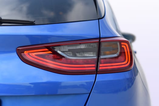 the tail lights on a luxury passenger car