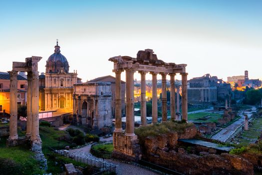 Roman ruins in Rome, Forum. Ancient ruins of the Romanum Forum. Ruins of Septimius Severus Arch and Saturn Temple, Rome, Italy.