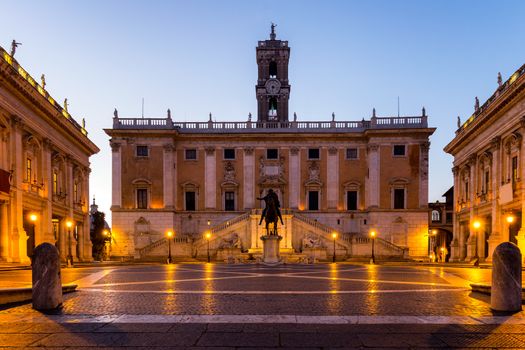 Italy Rome Capitoline hill city square museum buildings and statue illuminated at sunrise