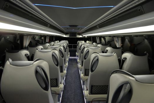 the interior of a high-class tourist bus, bus seats