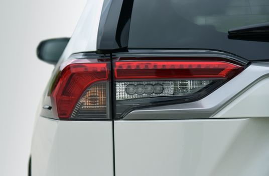 the tail lights on a luxury passenger car