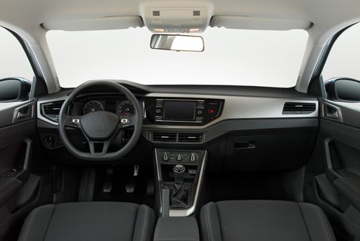 studio shot passenger car interior, front view