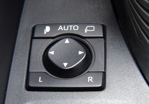 side mirror switch control, car interior detail