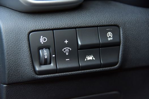 panel with buttons on the control panel of car