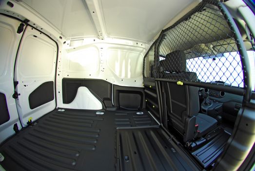 Inside commercial van with opet side door