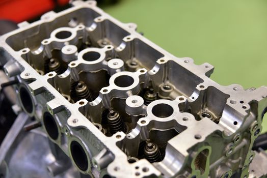 car engine disassembled in a car repair shop