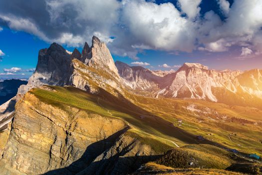 View on Seceda peak. Trentino Alto Adige, Dolomites Alps, South Tyrol, Italy. Odle mountain range, Val Gardena. Majestic Furchetta peak. Odles group seen from Seceda, Santa Cristina Val Gardena.